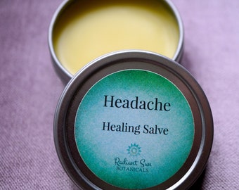 May include: A small silver tin with a teal and green label that reads "Headache Healing Salve" and "Radiant Sun Botanicals".