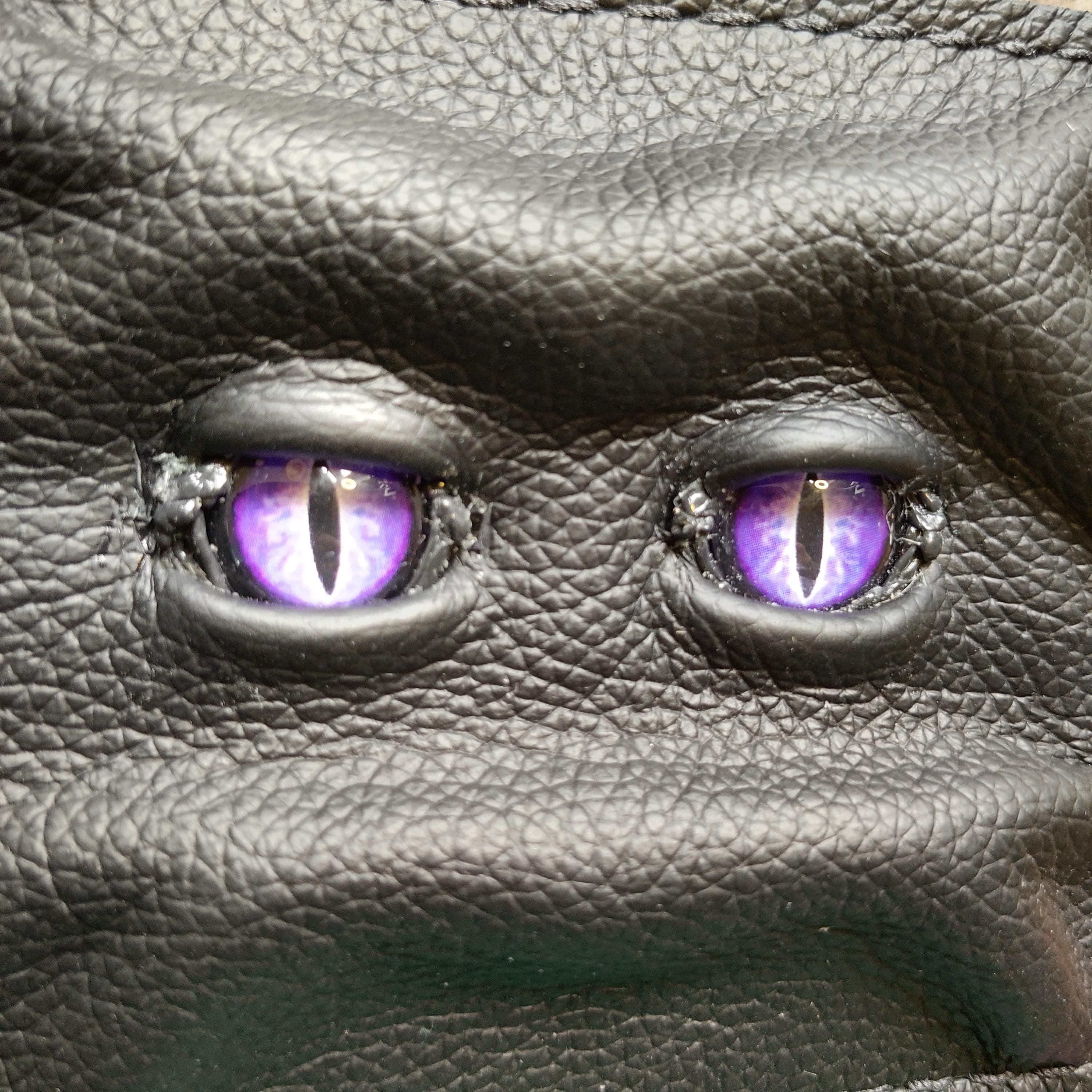Purple Eyes Grumpy Schmuggle Face Leather Wallet - Necromonicon