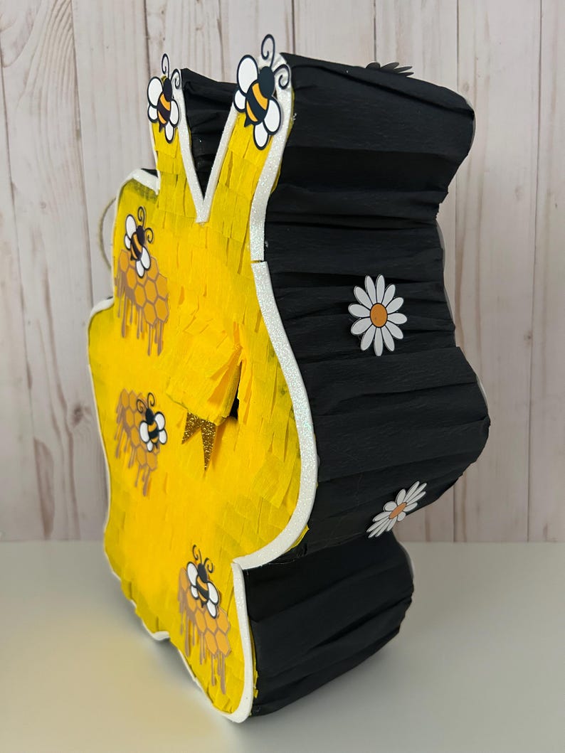 May include: A rustic wooden sign with the text "Welcome to our home" in white lettering. The sign features a distressed finish and a simple, inviting design, perfect for a front porch or entryway.