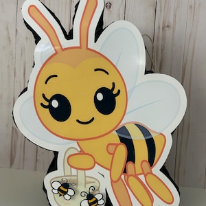 May include: A set of three ceramic mugs with a speckled, matte finish. Each mug features a different color: light blue, cream, and gray. The mugs have a simple, modern design and a comfortable handle.