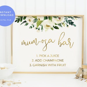 May include: A printable sign for a "mum-osa bar" with white flowers and greenery at the top. The sign has gold text that reads "mum-osa bar" and instructions for making a mimosa: "1. Pick a juice, 2. Add champagne, 3. Garnish with fruit."