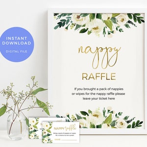 May include: White floral printable sign with gold text that reads "nappy raffle". The sign says "If you brought a pack of nappies or wipes for the nappy raffle please leave your ticket here".