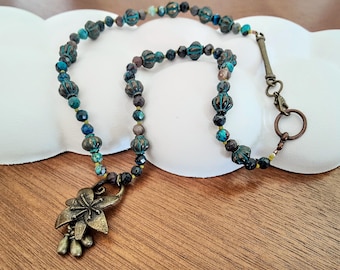 bronzed blue flower charm becklace