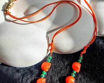 skull necklace orange howlite & green male white