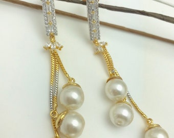 New Arrival, White American Diamond Pearl dangle and drop earrings.