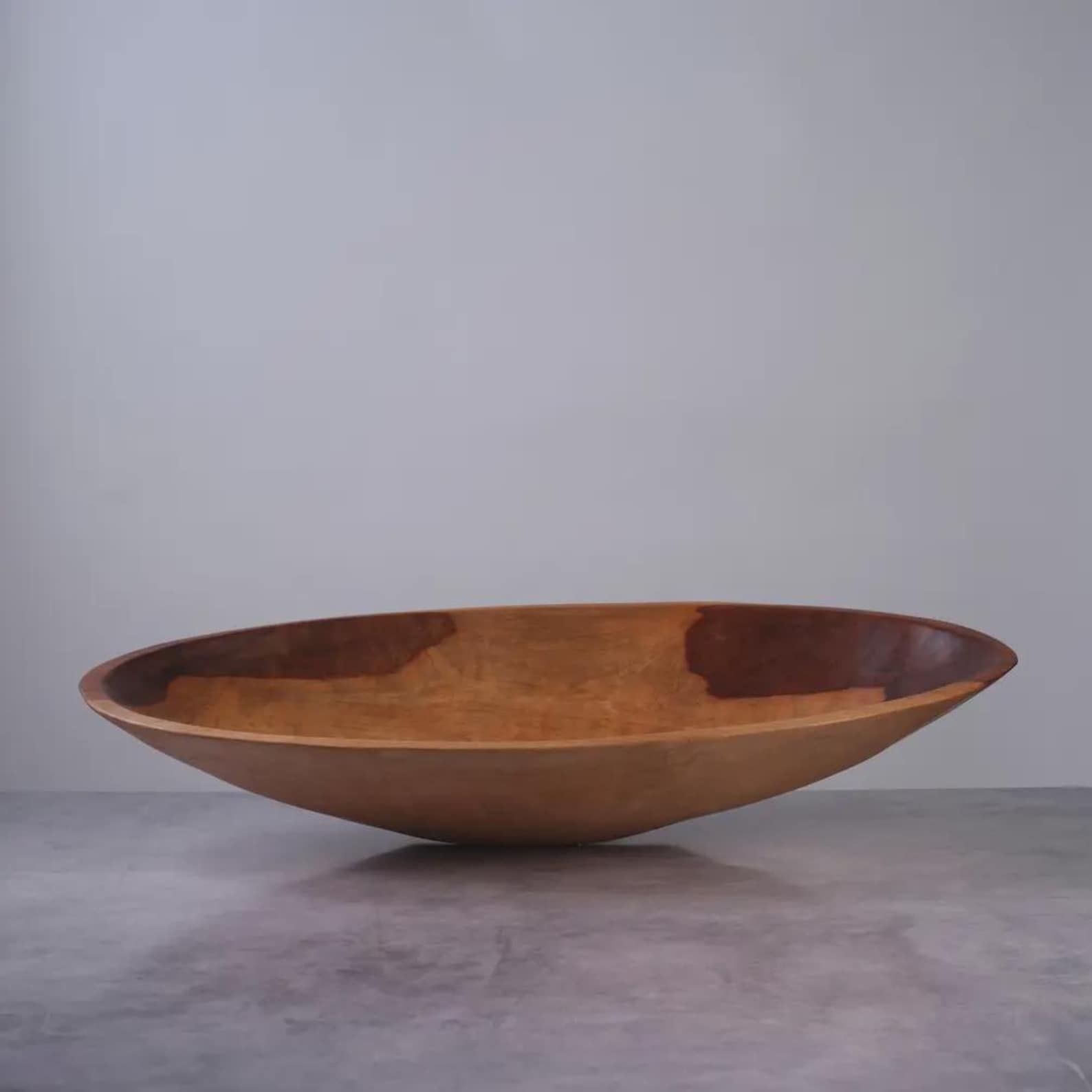 Large hand-carved oval wooden bowl for a cowgirl coastal kitchen