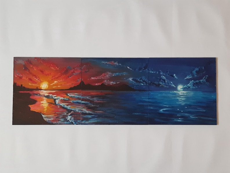 May include: A painting depicting a seascape with a vibrant sunset on the left side and a moonlit night on the right side. The sky is filled with clouds, and the ocean is a deep blue with waves crashing on the shore.