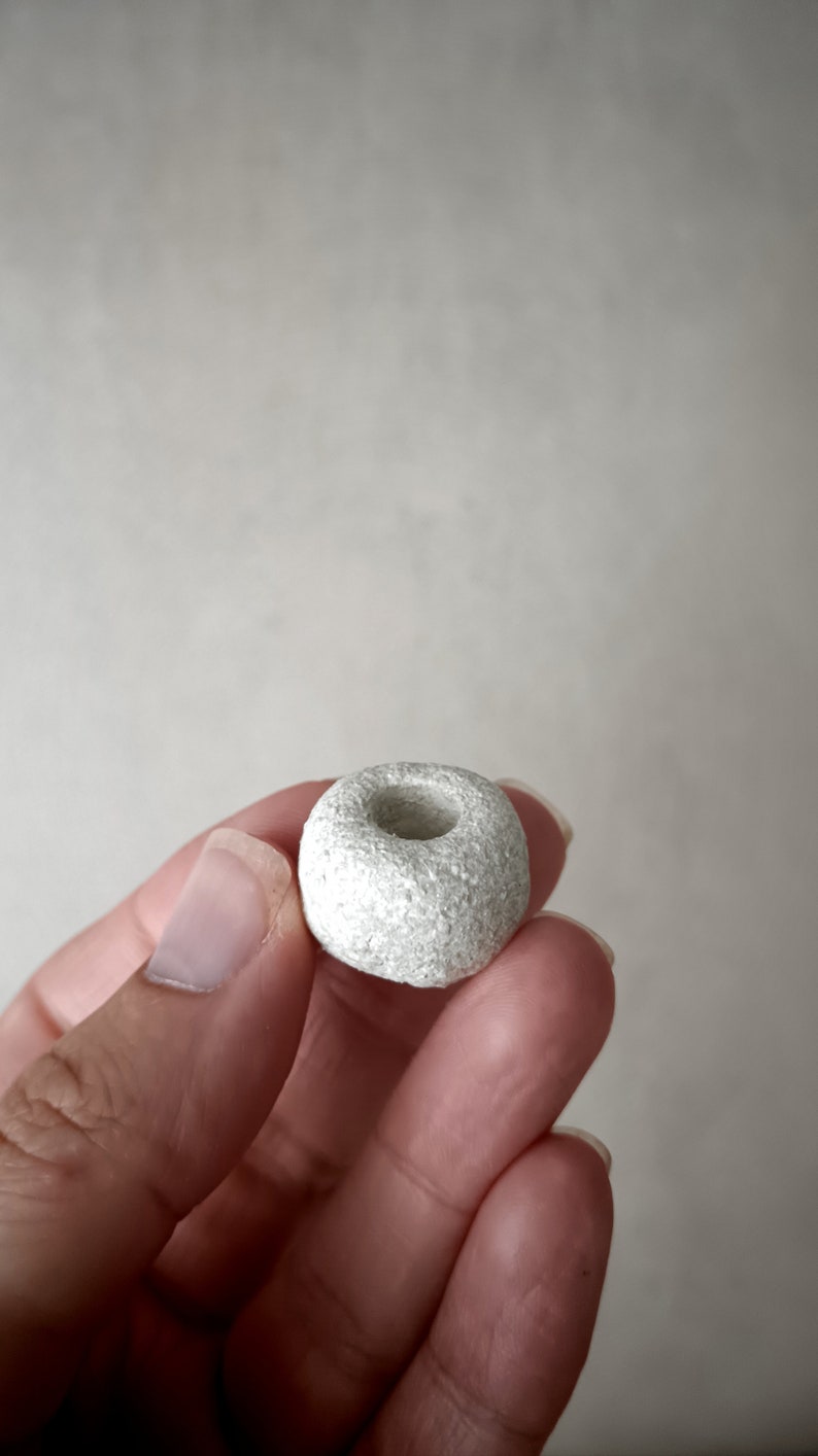 Tiny ceramic candle holder