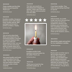 May include: A set of five small, white, beeswax candles with a natural, wooden wick. The candles are displayed in a hand, with the flame lit on one of the candles. The candles are perfect for meditation or journaling.