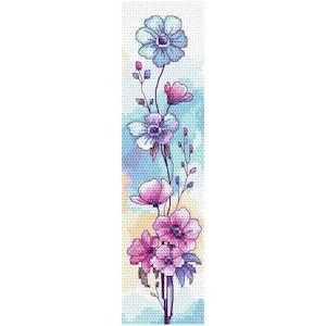 May include: A cross-stitch design of a floral arrangement in shades of blue, pink, and purple. The flowers have detailed petals and are set against a watercolour-style background. The design is on a white, textured fabric.