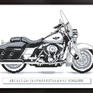May include: Black and white line art illustration of a classic motorcycle. The motorcycle has a large windshield, saddlebags, and a detailed engine.
