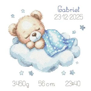 May include: A cross-stitch design of a sleeping teddy bear on a cloud, covered with a blue blanket. The design includes the name "Gabriel" and the date 23-12-2025. The bear weighs 3450g and is 56cm long. The time is 23:40. Blue stars surround the bear.