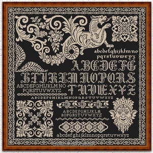 May include: A framed cross-stitch pattern with a black background and beige design elements. The design includes an alphabet, floral motifs, a dragon, and decorative borders. The text "INSTANT DOWNLOAD PDF" is at the bottom.