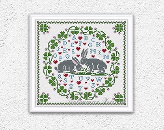Two hares in love cross stitch pattern Spring cross stitch Primitive quaker sampler embroidery design Clover wreath xstitch chart PDF #1000*