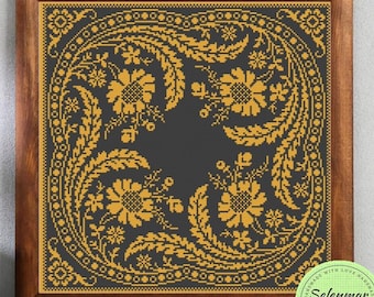 Könnte beinhalten: Ein gerahmtes Kreuzstichmuster mit schwarzem Hintergrund und goldenem Blumendesign. Das Muster ist von einem braunen Rahmen umgeben. Das Bild enthält auch ein kreisförmiges Logo mit dem Text "Selenmar Xstitch" in der Mitte.