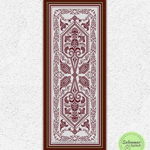 May include: A rectangular cross stitch pattern featuring a vertical, symmetrical design in deep maroon thread on a white fabric background. The intricate motif includes stylized floral and geometric elements enclosed within a dark brown frame.