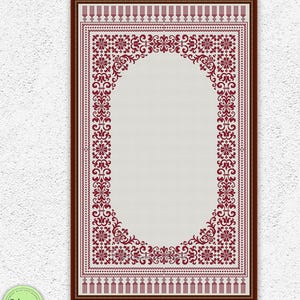 Op de afbeelding: Een ingelijst kruissteekpatroon met een centraal ovaal ontwerp. Het patroon heeft een bordeauxrode bloemenrand en decoratieve elementen op een crèmekleurige achtergrond. De tekst "INSTANT DOWNLOAD PDF" staat onderaan.