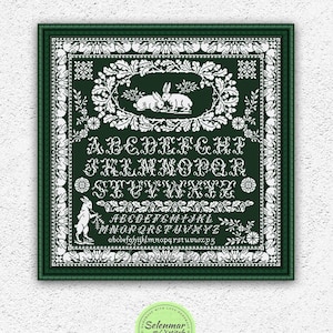 May include: A green cross-stitch pattern featuring a full alphabet with bunnies and floral designs. The pattern is framed in a green border with a white inner border. The text "Handmade with love" and "Selenmar Xstitch" are visible in the lower right corner.