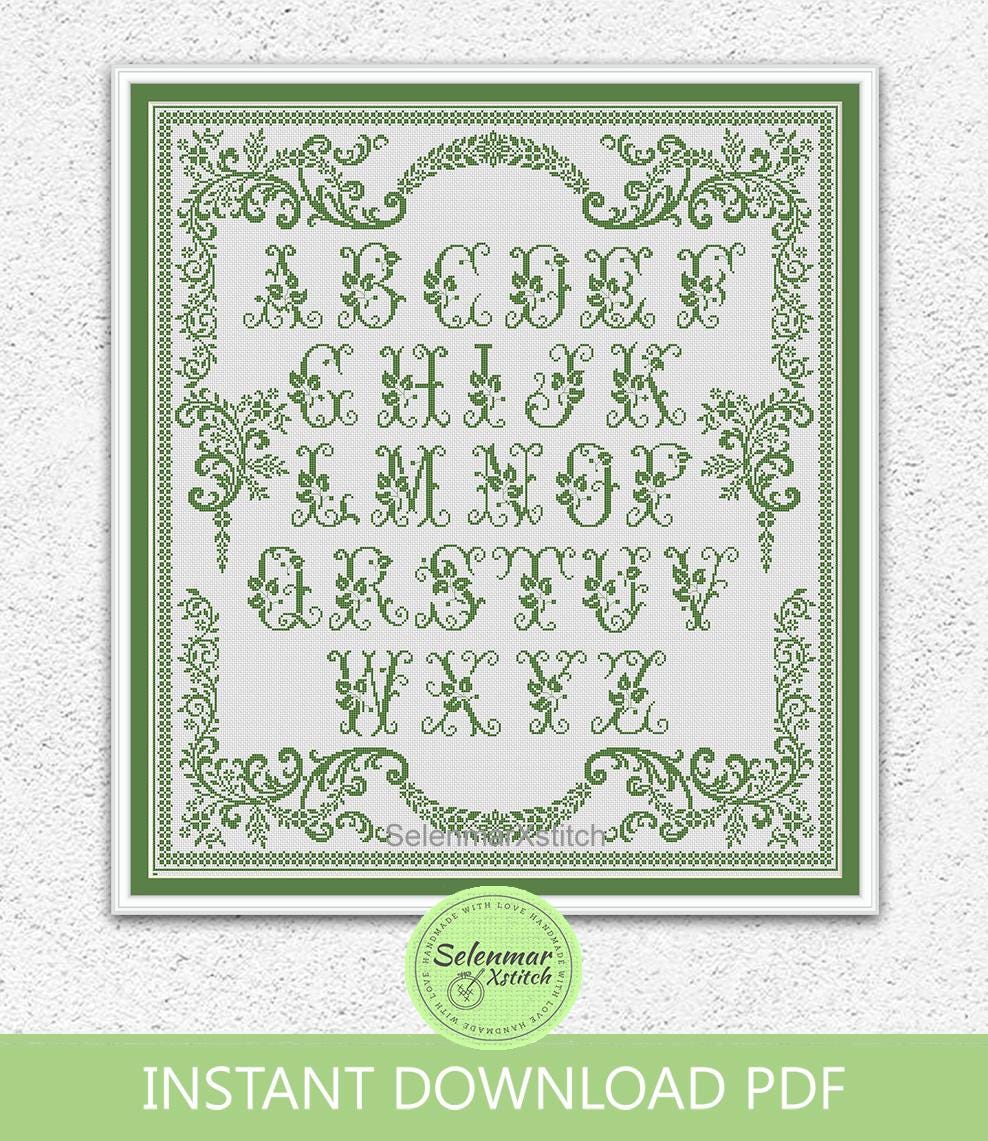 Motif alphabet monochrome au point de croix, broderie de lettres