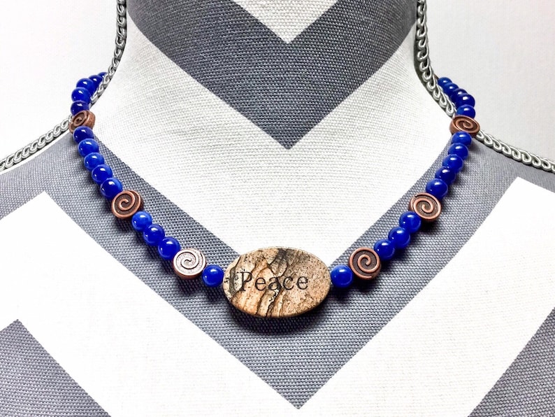 Peace granite focal on cobalt blue jade necklace with matching earrings