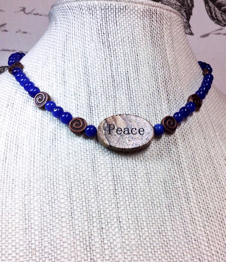 Peace granite focal on cobalt blue jade necklace with matching earrings