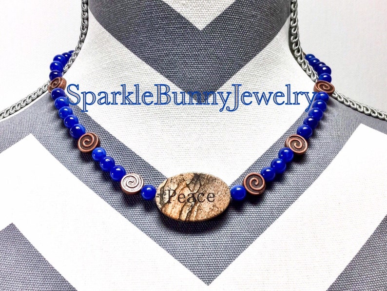 Peace granite focal on cobalt blue jade necklace with matching earrings