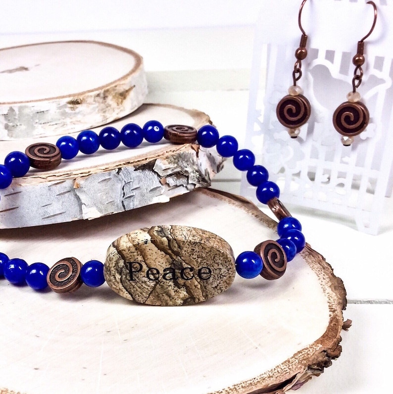Peace granite focal on cobalt blue jade necklace with matching earrings
