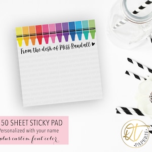 May include: A 50-sheet sticky note pad with a rainbow crayon border and the text "From the desk of Miss Randall". The sticky note pad is personalized with your name and has a custom font color option.