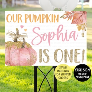 May include: A pink and gold pumpkin themed yard sign with the text "Our Pumpkin Sophia is One!"  The sign has a stand included for shipped orders.  You can also print your own sign.