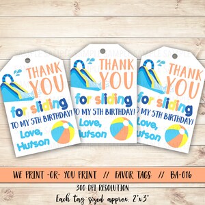 May include: Three white favor tags with a blue and yellow water slide and beach ball design. The text on the tags reads "Thank You for sliding to my 5th birthday! Love, Hutson".