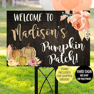May include: A black and brown wooden sign with the text "Welcome to Madison's Pumpkin Patch!" in white lettering. The sign is decorated with autumnal elements, including pumpkins, leaves, and flowers. The sign is on a metal stand.