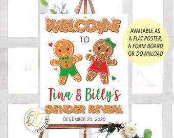 May include: A welcome sign for a gender reveal party featuring gingerbread people. The sign reads "Welcome to Tina & Billy's Gender Reveal" with the date December 21, 2020. Available as a flat poster, foam board, or download.