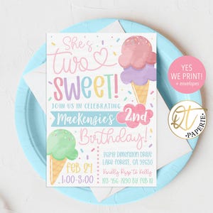 May include: A pink and blue ice cream cone birthday invitation with the text "She's Two Sweet!" and "Mackenzie's 2nd Birthday!"  The invitation includes the date, time, and address for the party.  RSVP information is also included.