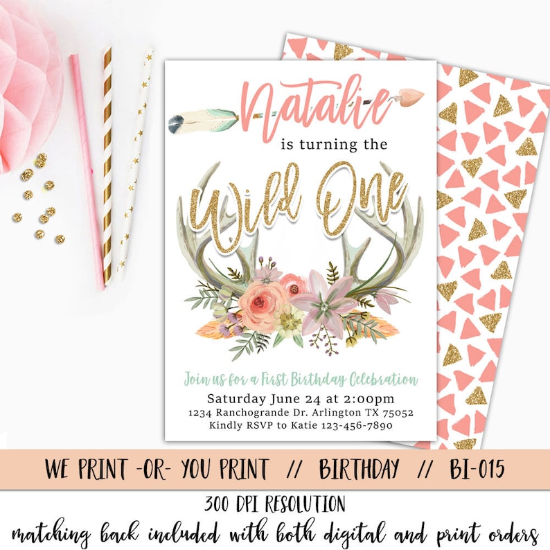 May include: A printable invitation for a first birthday party with a woodland theme. The invitation features a floral wreath with antlers, a gold glitter "Wild One" text, and the name "Natalie".