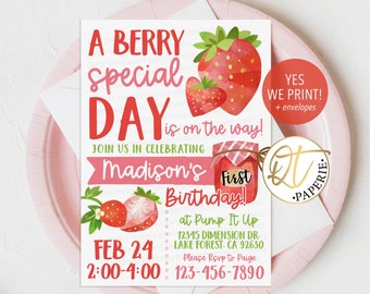 May include: A pink and red invitation card with a strawberry theme. The text reads "A Berry Special Day is on the way! Join us in celebrating Madison's First Birthday!"  The invitation includes the date, time, and location of the party.  It also includes the text "Yes We Print! + envelopes".