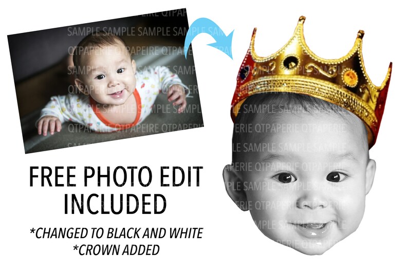 May include: A black and white photo of a baby wearing a gold crown. The baby is smiling and looking at the camera. The crown has red and gold accents.