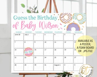 May include: A white calendar with a donut theme for a baby shower. The calendar has the months of June and July with the days of the week listed. The text "Guess the Birthday of Baby Wilson" is at the top of the calendar. The due date is marked with a pink donut with the words "Due Date" inside. The calendar is available as a poster, foam board, or JPG file.