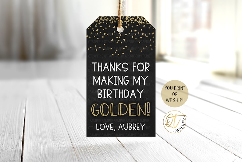 May include: Black and gold thank you tag with gold confetti. The tag says "Thanks for making my birthday golden! Love, Aubrey".