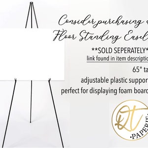 May include: Black metal easel with adjustable plastic supports. The easel is 65 inches tall and is perfect for displaying foam boards. The text "SOLD SEPERATELY" and "link found in item description" is visible in the image.