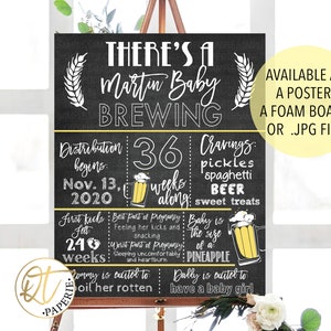 May include: A chalkboard style pregnancy announcement with the text "There's a Martin Baby Brewing". The announcement includes details about the pregnancy, such as the due date, cravings, and the size of the baby. The announcement is available as a poster, foam board, or JPG file.