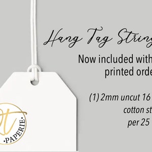 May include: White hang tag with a gold circle logo that says "QT Paperie". The tag is attached to a white string. The text on the tag reads "Hang Tag Strings Now included with all printed orders! (1) 2mm uncut 16 foot cotton string per 25 tags"