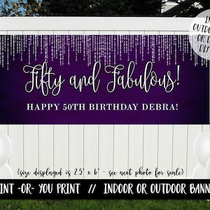 May include: Purple banner with silver glitter and the text "Fifty and Fabulous! Happy 50th Birthday Debra!"  The banner is displayed on a white picket fence.  The size of the banner is 2.5 feet by 6 feet.