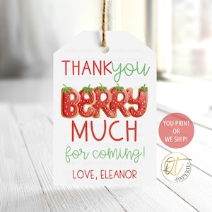 May include: A white gift tag with the text "THANK YOU BERRY MUCH for coming! LOVE, ELEANOR" in red and green. The word "BERRY" is designed with strawberry-shaped letters. A small pink circle says "YOU PRINT OR WE SHIP!"