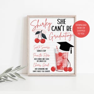 May include: A framed print with a graduation theme. The artwork features a cocktail recipe with cherries, a graduation cap, and the text "Shirley, She Can't Be Graduating!" in red and black. A red circle with white text says "Download Now or Shipped to You."
