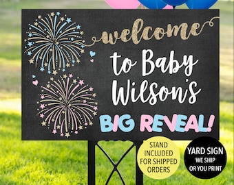 May include: A black yard sign with the text "welcome to Baby Wilson's BIG REVEAL!" in white and blue. The sign has gold glitter accents and fireworks illustrations in pink and blue. A stand is included for shipped orders.