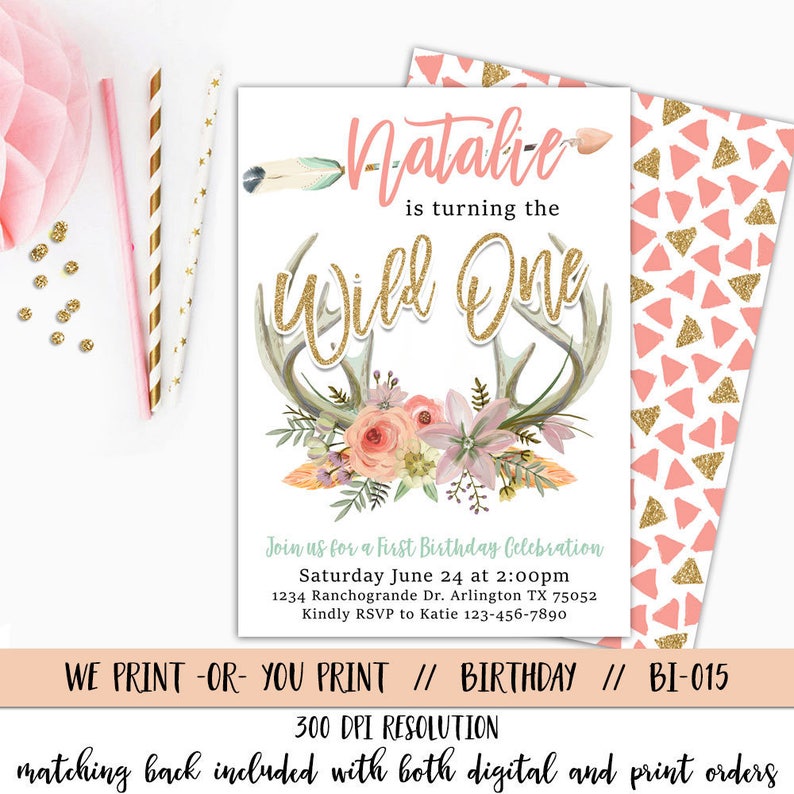 May include: A printable invitation for a first birthday party with a pink and gold color scheme. The invitation features a floral design with antlers and the text "Natalie is turning the Wild One".