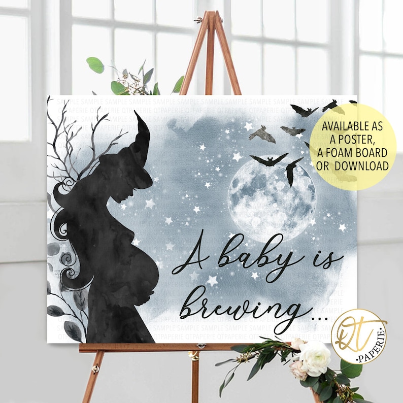 May include: A blue and white Halloween baby shower sign with a silhouette of a pregnant witch and the text "A baby is brewing..."