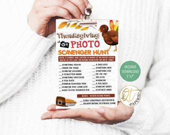 May include: A printable Thanksgiving photo scavenger hunt game card with a turkey illustration and a list of items to photograph. The card is 5x7 inches and includes a bonus worth double points for photographing an early Christmas decoration or a disappointing football game.