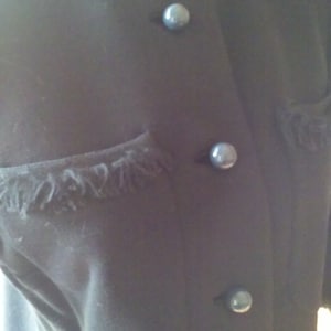 Vintage 1960s black wool knit jacket
