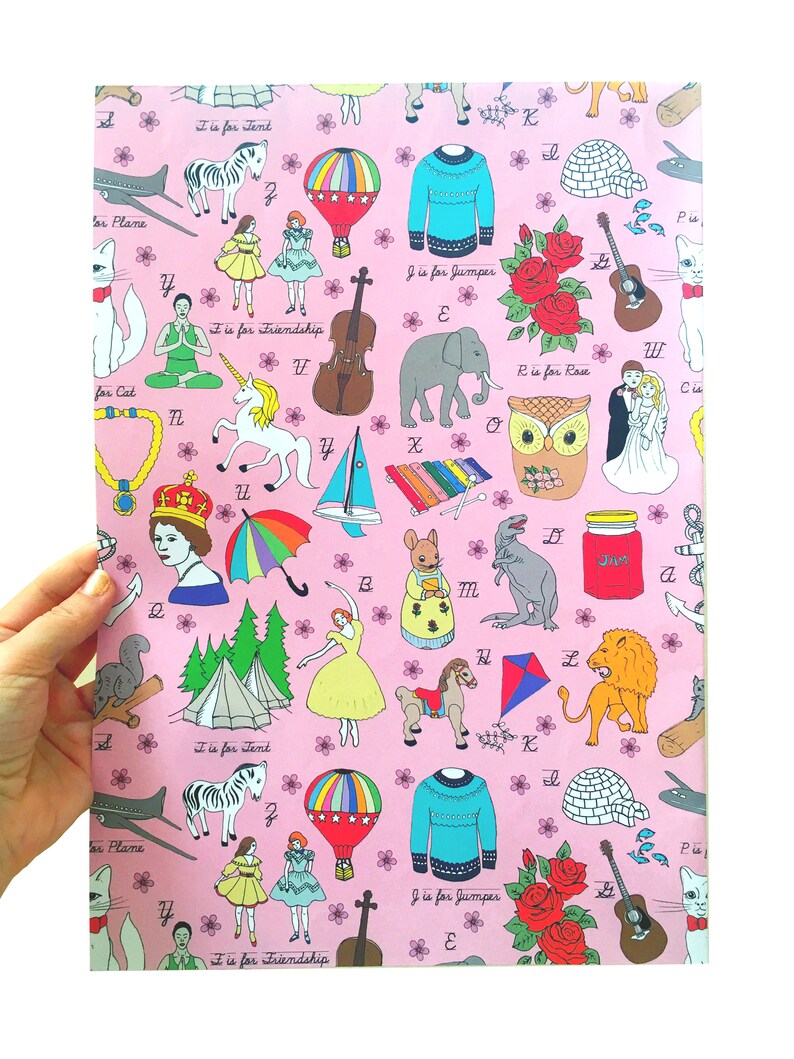 May include: A pink background with a repeating pattern of illustrations and letters of the alphabet. Each letter is paired with an image and a phrase that starts with that letter. For example, "T is for Tent" is paired with an image of a tent.